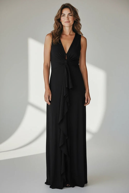 Model wearing a Nu-Nv Clothing Gianfranco Ferre Studio black sleeveless V-neck evening gown with front knot detail.