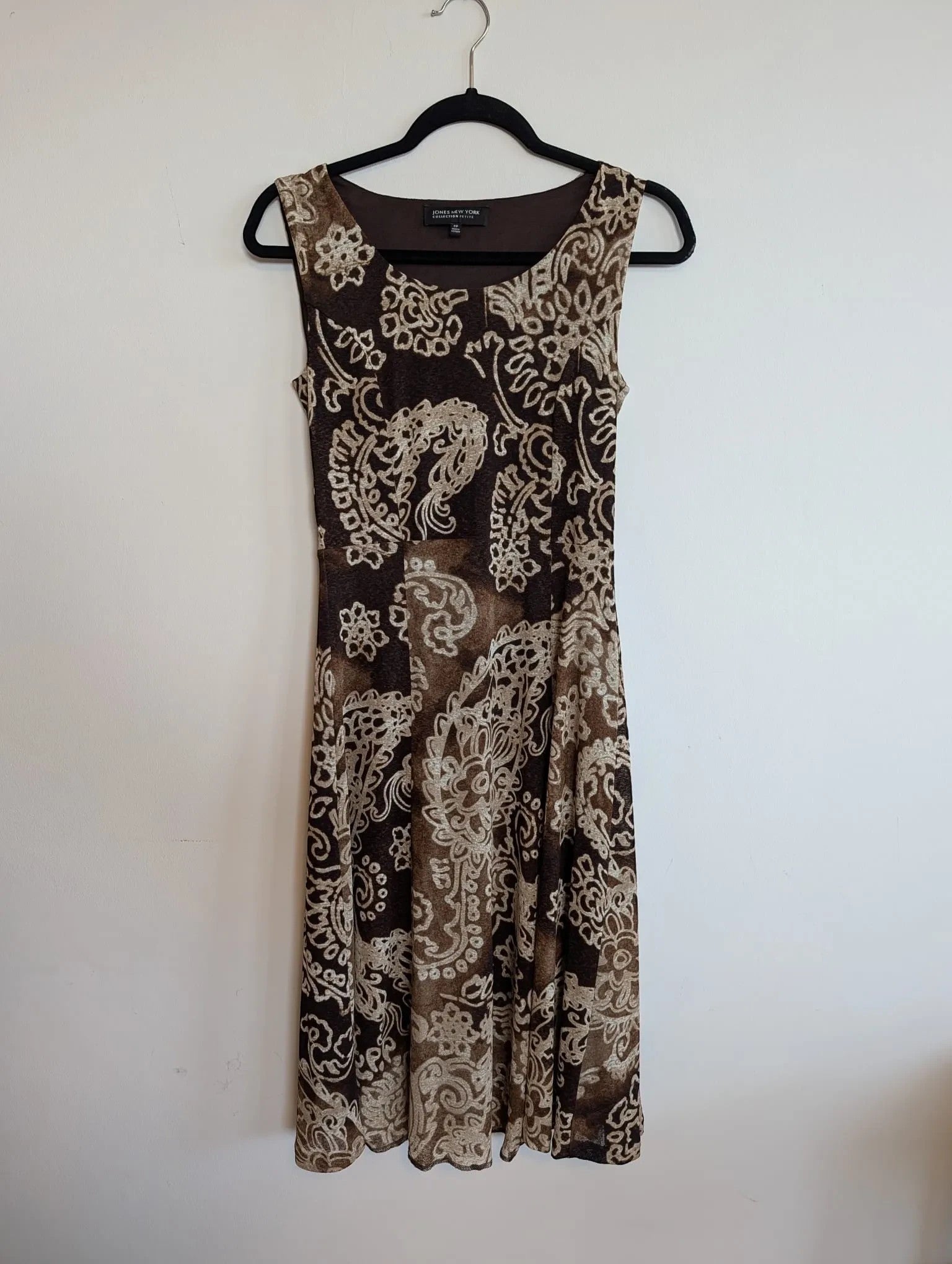 Nu-Nv Clothing Jones New York Petite sleeveless brown and cream paisley print fit and flare dress with scoop neck.
